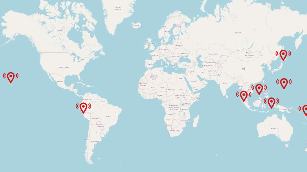 World map displaying recent earthquake locations and magnitudes